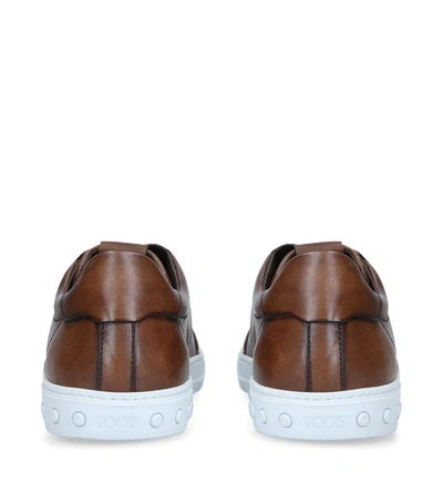 Shop Tod's Leather Cassetta T Sneakers