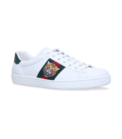 Shop Gucci Tiger Ace Sneakers