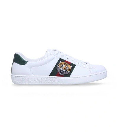Shop Gucci Tiger Ace Sneakers