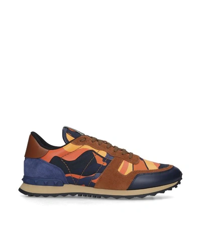 Shop Valentino Garavani Leather Camouflage Rockrunner Sneakers