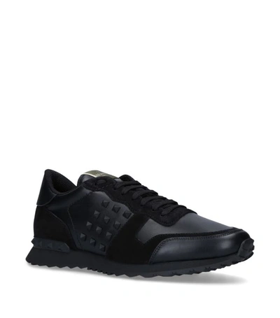 Shop Valentino Garavani Leather Stud Running Sneakers