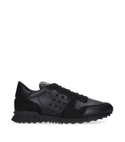 Shop Valentino Garavani Leather Stud Running Sneakers