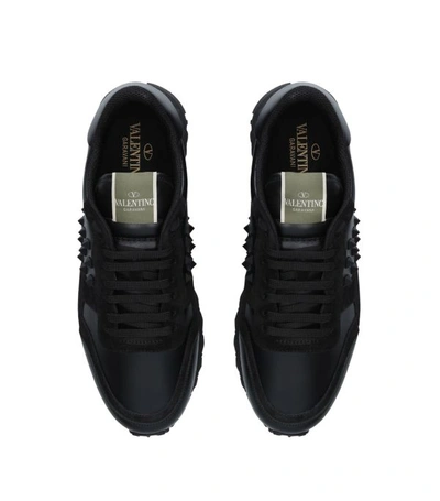 Shop Valentino Garavani Leather Stud Running Sneakers