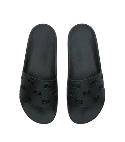 Shop Gucci Pursuit Cut-out Slides