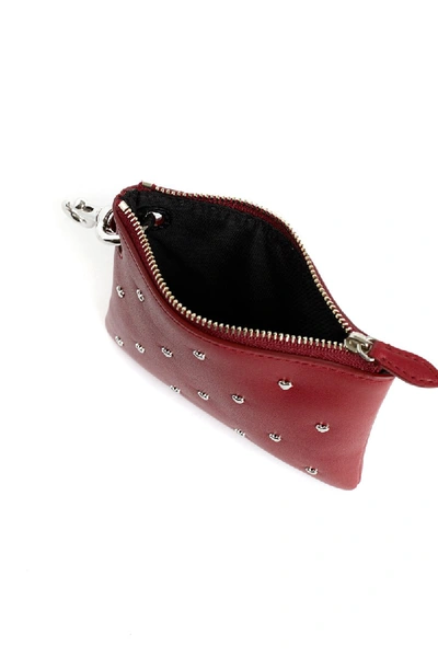 Shop Rebecca Minkoff Clip Pouch With Heart Studs In Cardinal