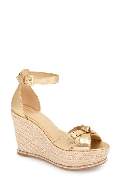 Shop Michael Michael Kors Ripley Wedge Sandal In Pale Gold