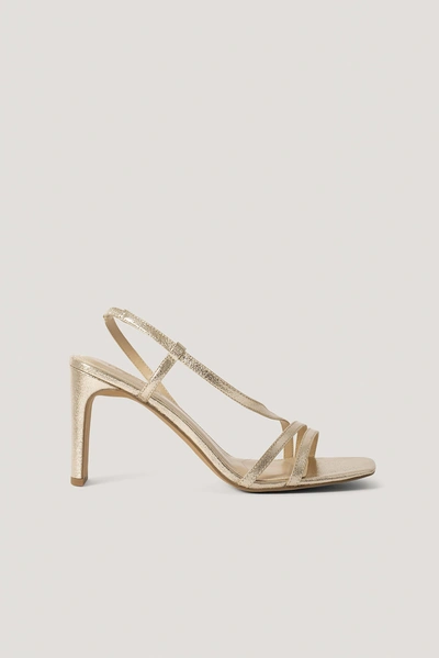 Shop Na-kd Asymmetric Strap Heels - Gold In Gold Metallic