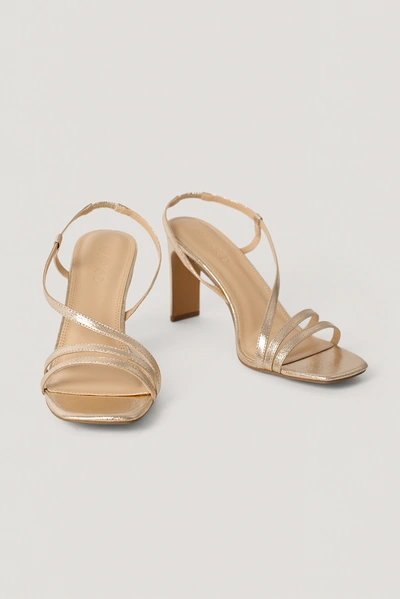 Shop Na-kd Asymmetric Strap Heels - Gold In Gold Metallic