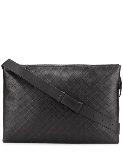 Shop Bottega Veneta Intrecciato Woven Messenger Bag In Black