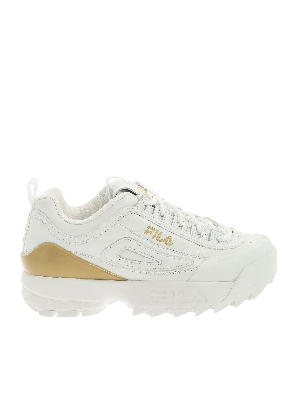 fila disruptor gold and white
