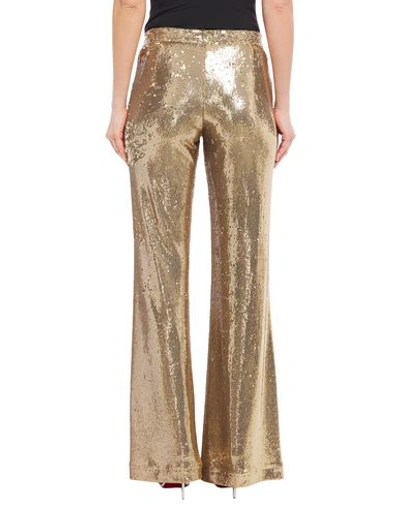 Shop Ainea Casual Pants In Gold
