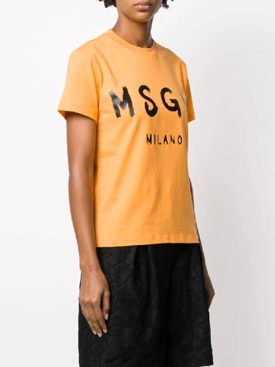 Shop Msgm Logo-print Crew Neck T-shirt In Orange