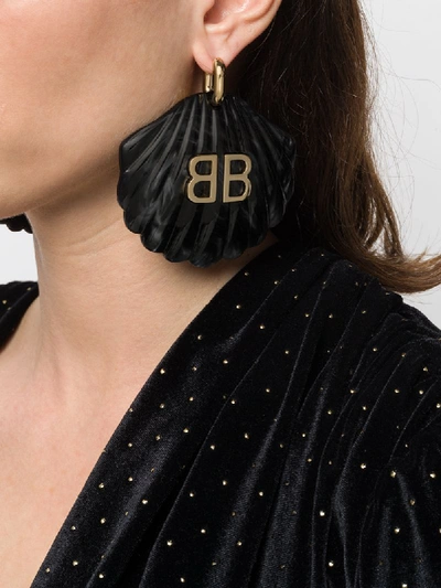 Shop Balenciaga Mermaid Shell Bb Earrings In Black