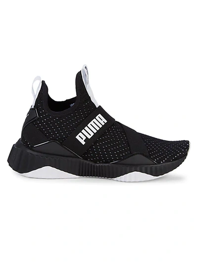 Shop Puma Defy Mid Core Perforated-knit Trainers In Black