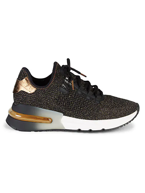 black trainers with gold trim
