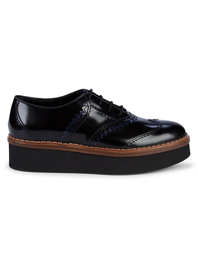 Shop Tod's Wingtip Patent Leather Platform Oxfords In Black