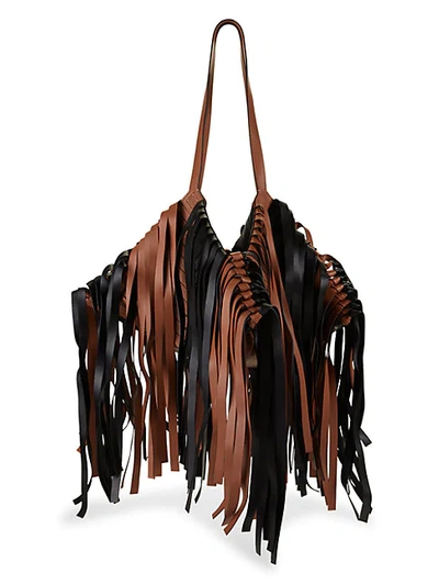 Shop Loewe Cocotte Fringed Leather Bag In Black Tan