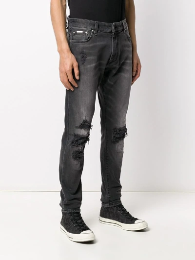 Shop Represent Distressed Design Jeans In Grey