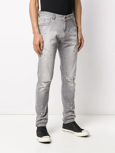 Shop Represent Slim Faded Jeans In Grey
