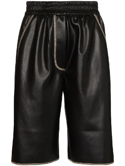 Shop Nanushka Yolie Faux-leather Shorts In Black