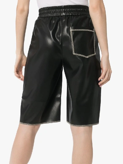 Shop Nanushka Yolie Faux-leather Shorts In Black