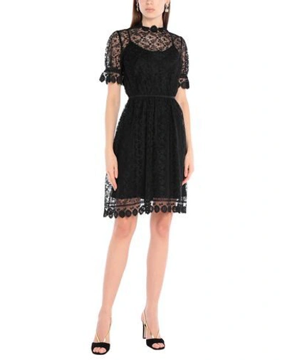 Shop Burberry Short Dresses In Black