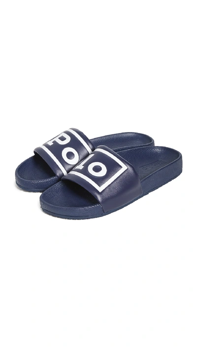 Shop Polo Ralph Lauren Cayson Polo Slides In Newport Navy/white