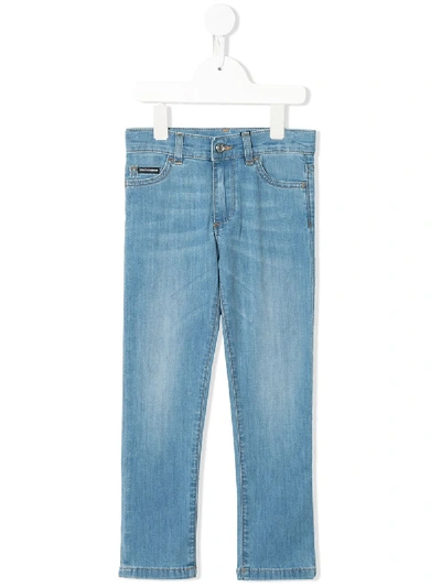 Shop Dolce & Gabbana Logo-appliqué Slim-cut Jeans In Blue