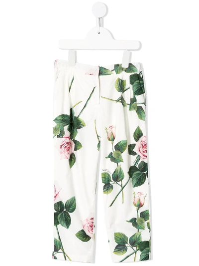 Shop Dolce & Gabbana Rose Print Trousers In White