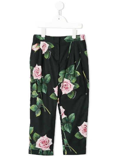Shop Dolce & Gabbana Rose Print Trousers In Black
