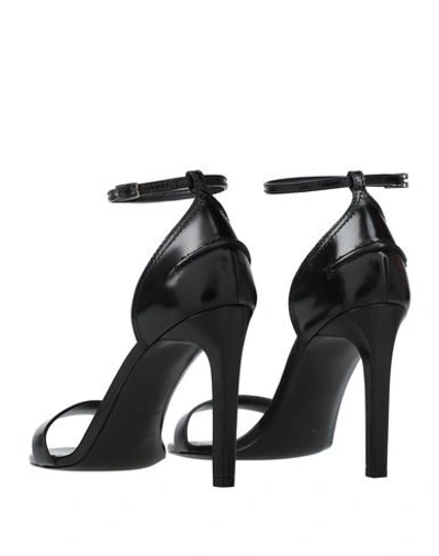 Shop Givenchy Sandals In Black