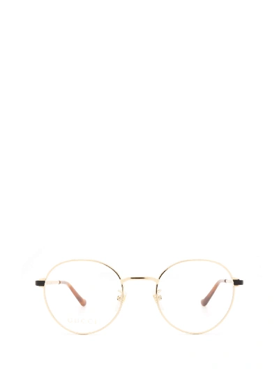 Shop Gucci Gg0581o Gold Glasses