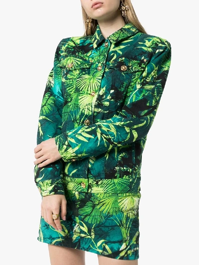 Shop Versace Jungle Print Denim Jacket In Green
