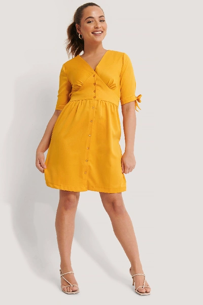 Shop Trendyol Satin Buttoned Detail Mini Dress - Yellow In Mustard