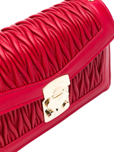 Shop Miu Miu Matelassé Shoulder Bag In Red