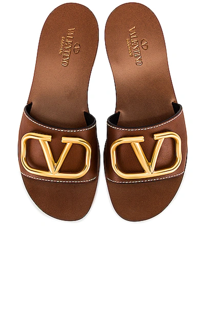 Shop Valentino Vlogo Slides In Cuoio