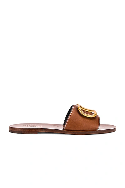 Shop Valentino Vlogo Slides In Cuoio