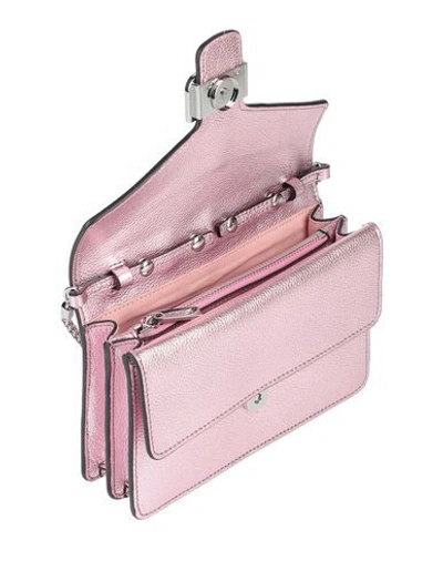 Shop Coccinelle Handbag In Pink