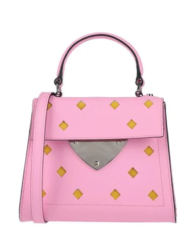 Shop Coccinelle Handbag In Pink