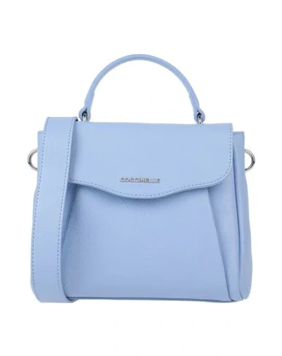 Shop Coccinelle Handbag In Sky Blue