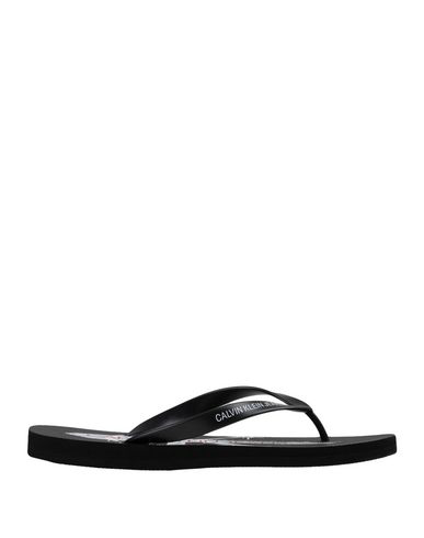 black calvin klein flip flops