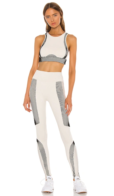 Shop Alo Yoga Electric Legging In Bone