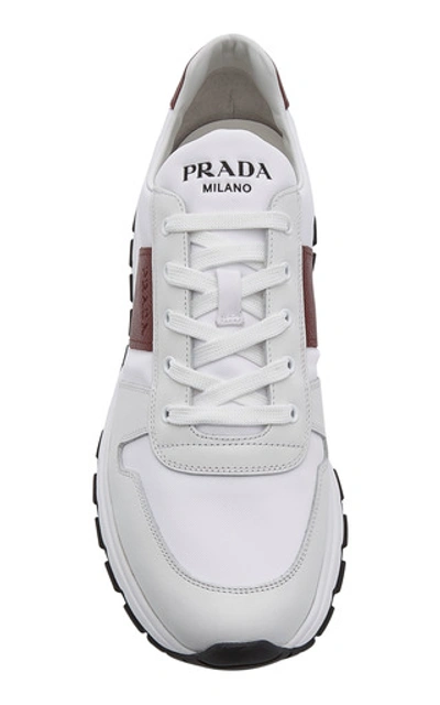 Shop Prada Lace-up Sneakers In White