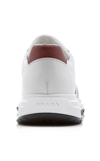 Shop Prada Lace-up Sneakers In White