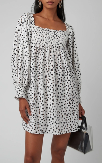 Shop Rixo London Bethany Printed Smocked Mini Dress In Black/white
