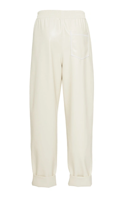 Shop Nanushka Selah Faux Leather Pants In White