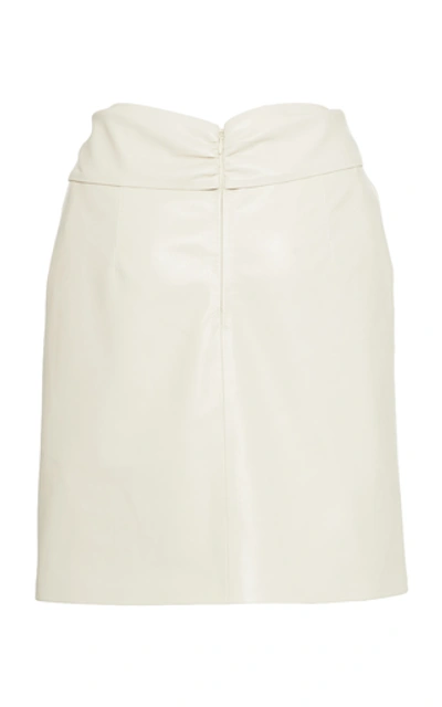 Shop Nanushka Milo Gathered Leather Mini Skirt In White