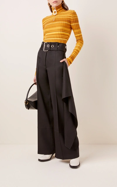 Shop Jw Anderson Full Length Handkerchief Belted Trousers In Black