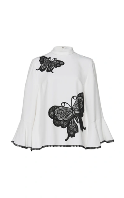 Shop Andrew Gn Butterfly Embroidered Mock Neck Blouse In Black/white