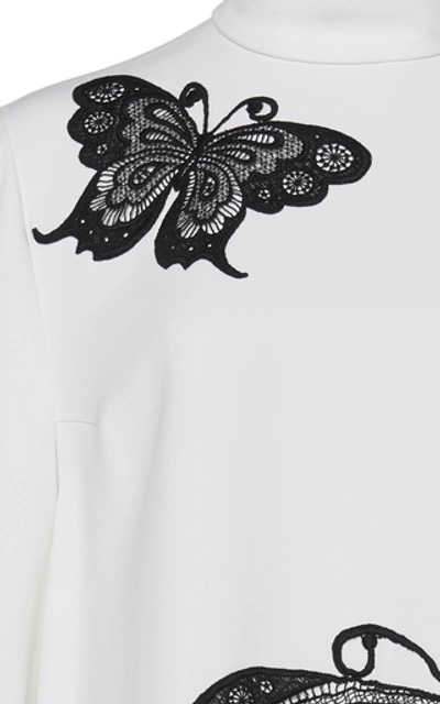 Shop Andrew Gn Butterfly Embroidered Mock Neck Blouse In Black/white